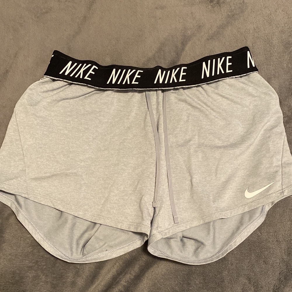 Womens nike shorts in gray, black nike band and white swoosh